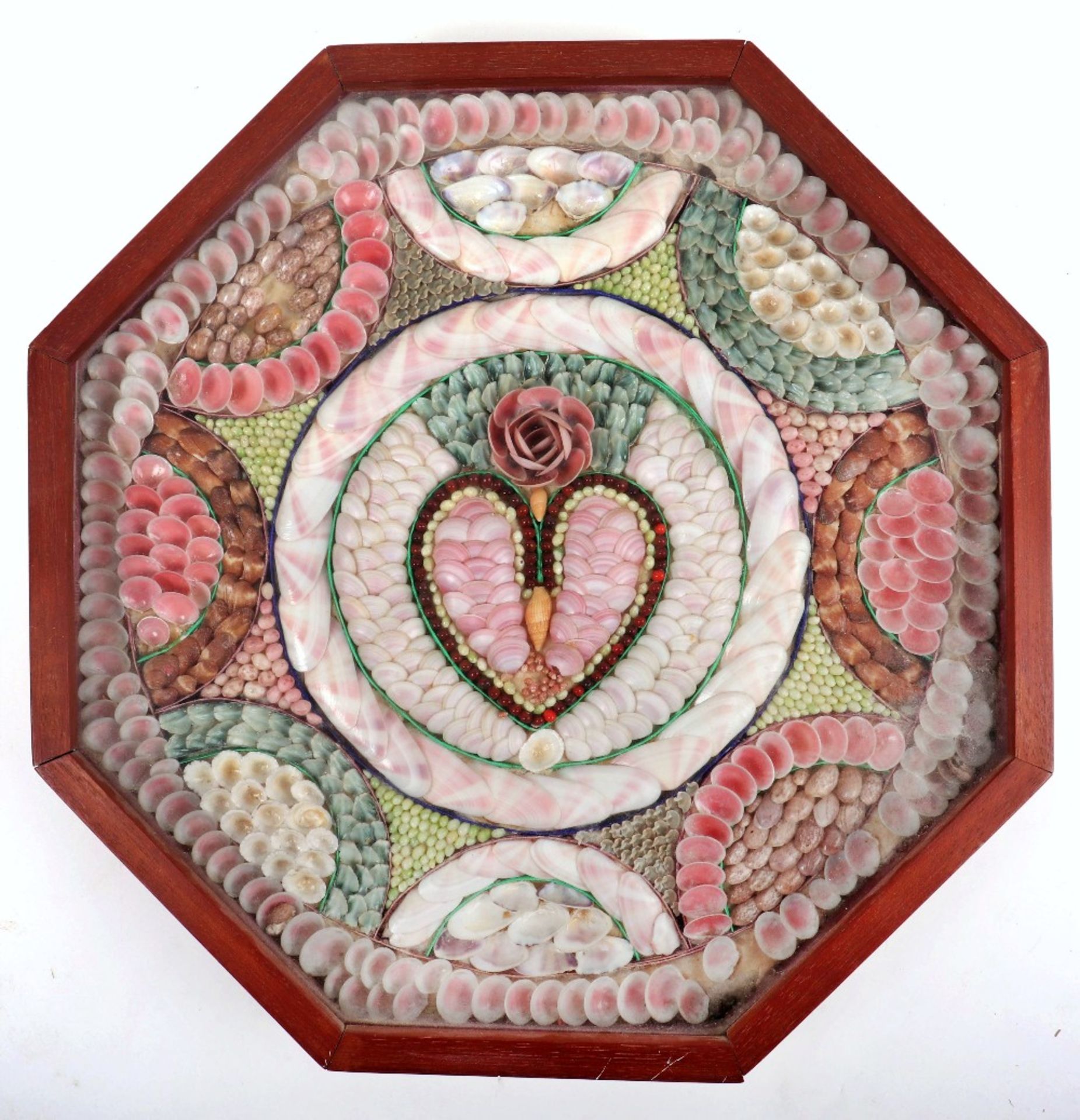 An early 19th century sailor’s shell valentine of typical octagonal form