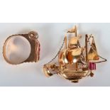 A Continental 18ct gold and ruby (possibly synthetic) brooch in the form of a ship, 5cmWx4.5cmW 11.9