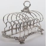 A Georgian silver toast rack, circa 1820
