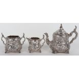 A Victorian three piece tea set, Charles Stuart Harris & Martin Goldstein, London 1885/1886,