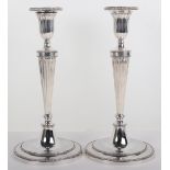 A pair of Victorian silver candlesticks, London 1880, Martin Hall & Co