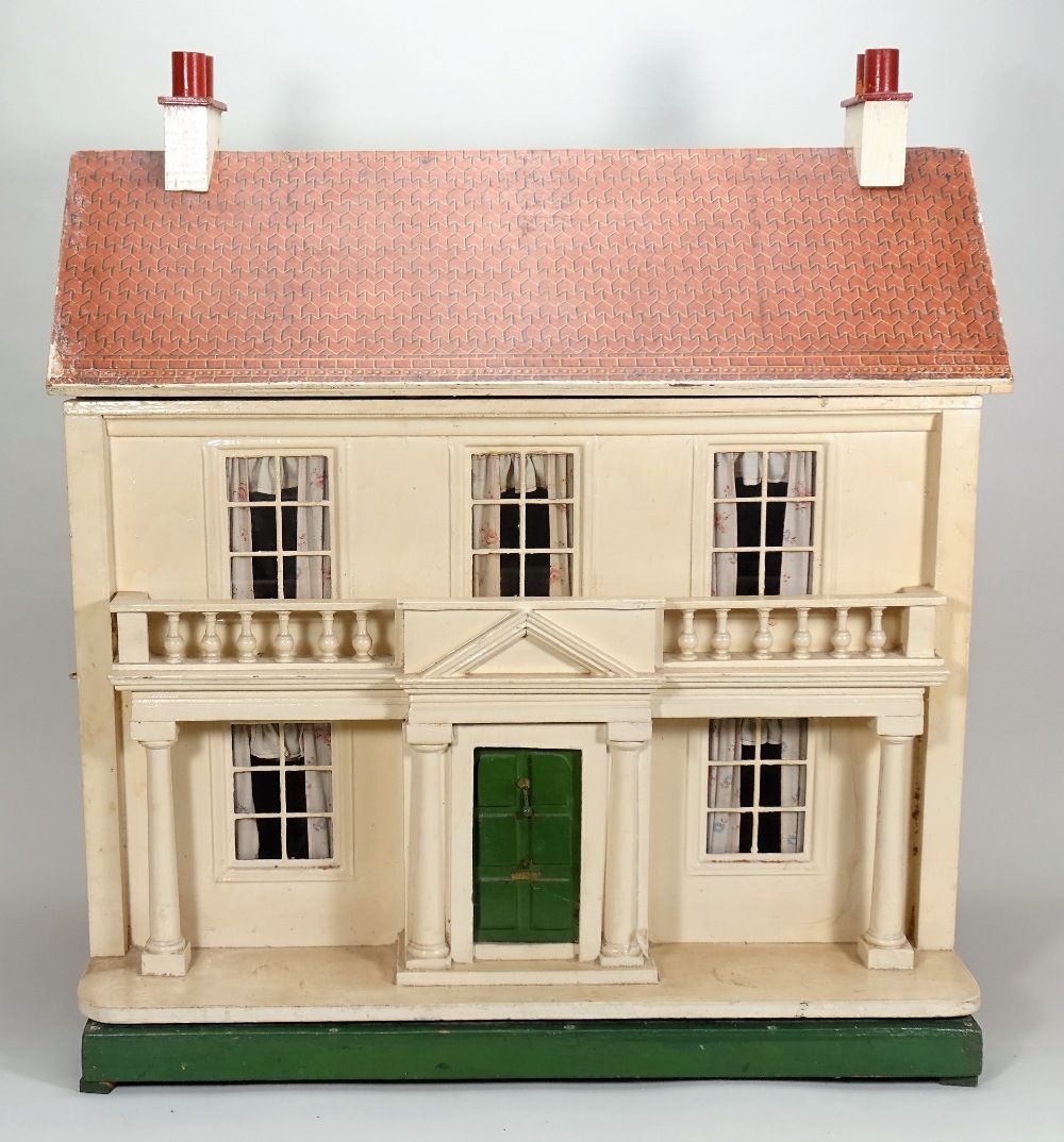 A Lines Bro wooden two storey dolls house, English circa 1910,