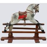 A G&J Lines carved and painted wooden rocking horse, 1920s,