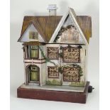 A charming wooden painted dolls house, probably D.H Wagner & Sohn, German 1920s,