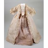 Rare and early ‘Robe a la Francaise’ pink silk sack-back gown for early wooden doll, 18th century