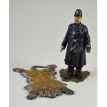 Painted lead Policeman ink well, circa 1900,