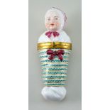 A Dresden porcelain Baby in Swaddling Scent Bottle holder, late 19th century,