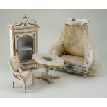 A four-piece set of decorative French miniature furniture, 1880s,