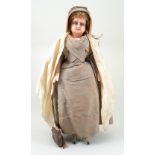 A rare poured wax ‘Quaker’ doll, English 1860s/70s,