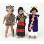 Three miniature all-bisque Mulatto dolls, German circa 1900,