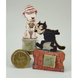 Mickey Mouse belt buckle, and Felix and Bonzo calendars,