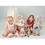 Three dolls, two bisque head and miniature dolls,