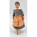 Carved wooden headed child doll by Huggler, Swiss 1920s,