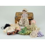 All bisque doll with additional clothes, German circa 1900,