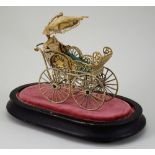 Miniature painted soft metal dolls pram with parasol, German circa 1890,