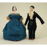 A miniature pair of rare early glazed china shoulder-head dolls on wooden jointed bodies, German mid