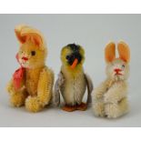 Schuco miniature mohair Penguin and two Rabbits, 1950s,