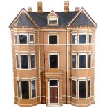 ‘Newick House’ a painted wooden English Town dolls house, circa 1880,
