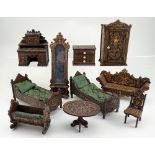 Group of miniature wooden dolls house furniture with carved decoration, German circa 1890,