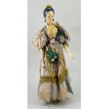 A fine and large painted wooden Grodner Tal doll and child, German circa 1820,