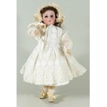 A D.E.P Jumeau type bisque head doll with rare walking and kissing mechanism, circa 1905,