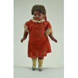 Small bisque head mulatto girl doll, German circa 1905,