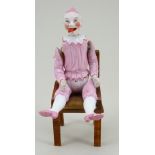 A rare all-bisque Clown with moving tongue, German 1870s,