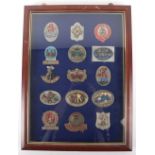 Fifteen Fine pewter fire insurance plaques, mounted in glass case