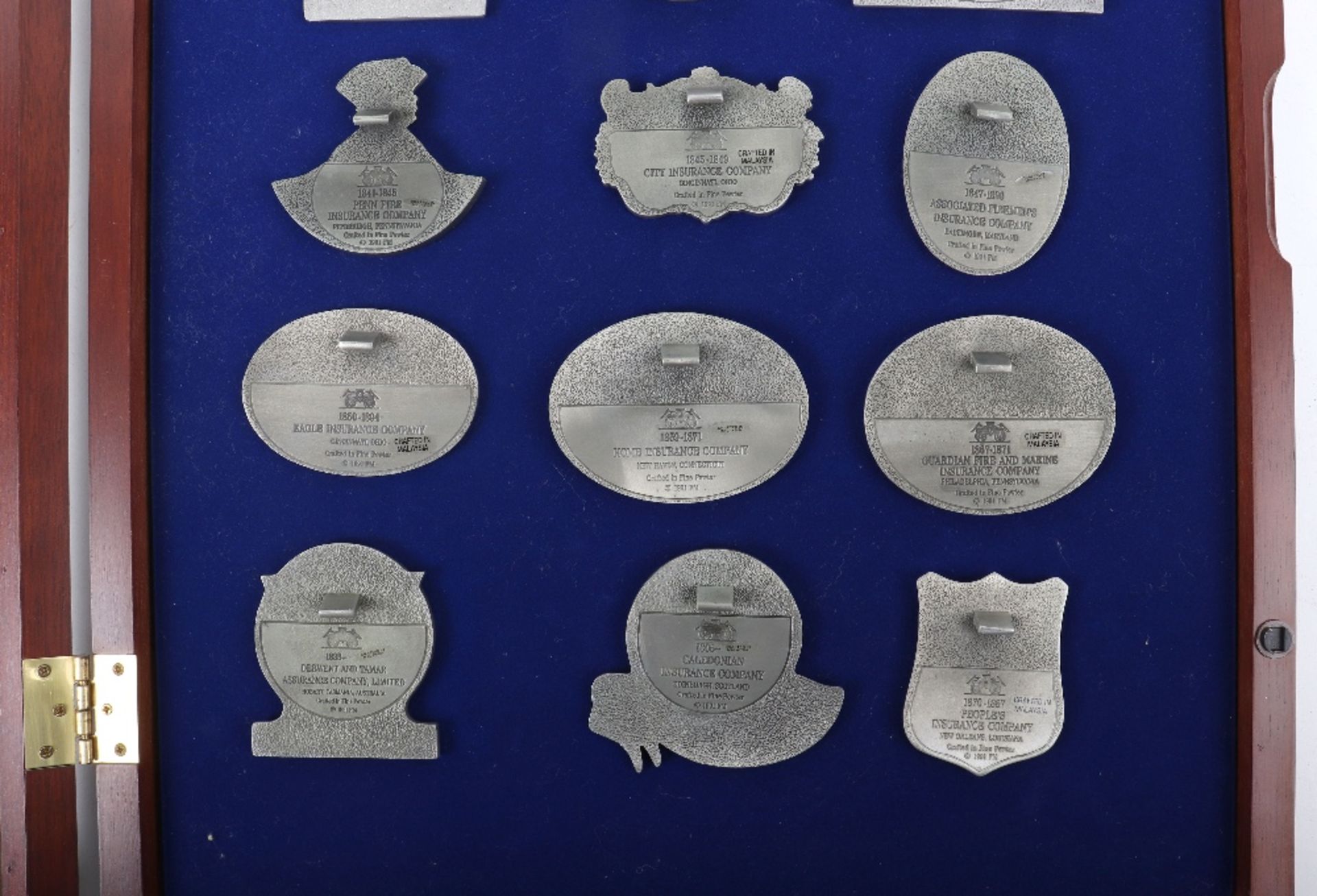 Fifteen Fine pewter fire insurance plaques, mounted in glass case - Image 5 of 5
