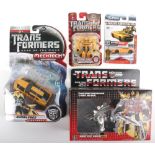 Three Hasbro Transformers Autobot Bumblebee models