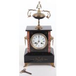 A 19th century French slate and red marble mantle clock
