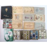 A large selection of matchboxes and cigarette cards