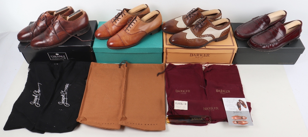 Four pairs of boxed men’s shoes