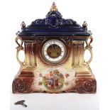 A 19th century painted ceramic cased mantle clock