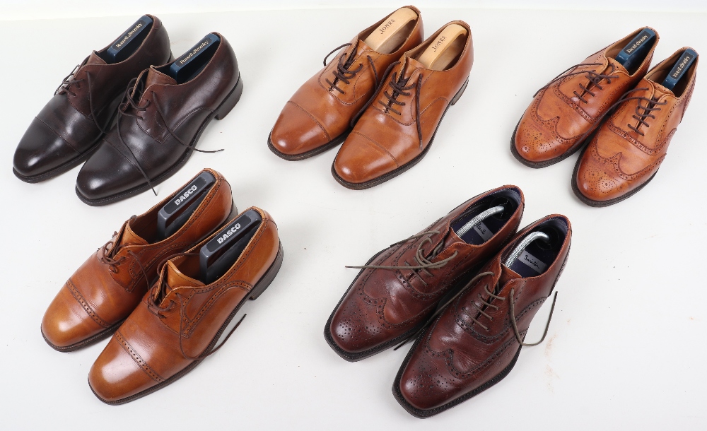 Five pairs of men’s brown leather shoes