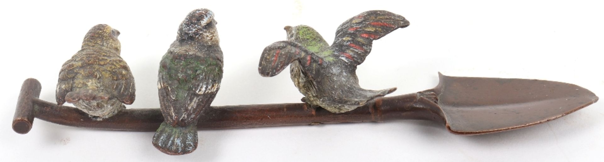 A 19th century cold painted bronze group of three birds sat atop a shovel, Austrian - Image 3 of 5