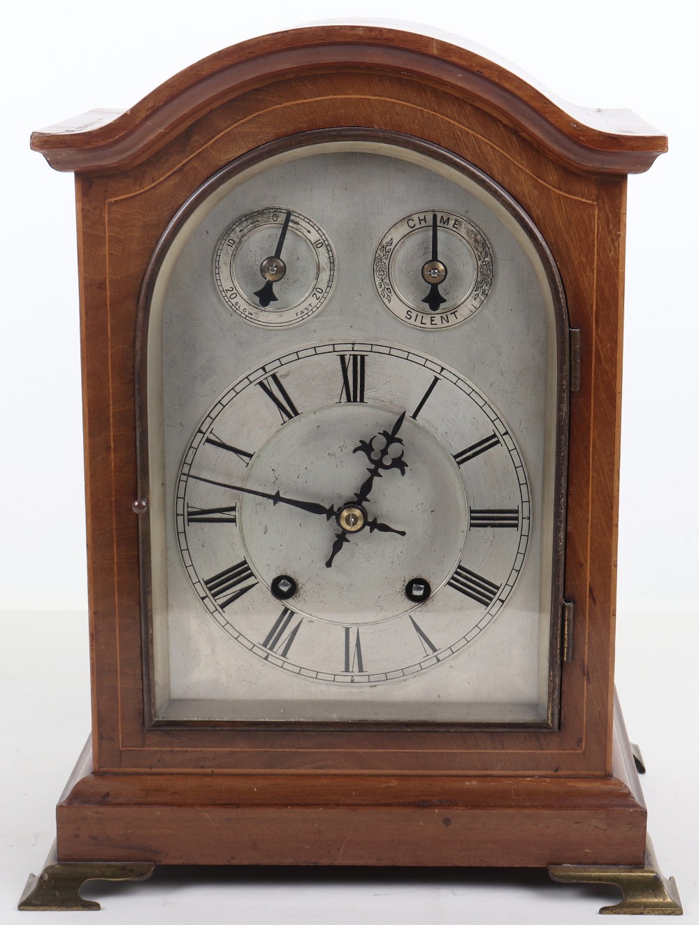 A 19th century mantle clock, silvered dial