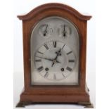 A 19th century mantle clock, silvered dial