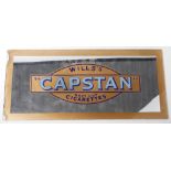 A Wills Cigarette painted glass sign ‘Capstan’