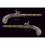 An extraordinary pair of transformed percussion pistols by Le Lorrain
