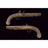 A pair of flintlock pistols signed Dubois