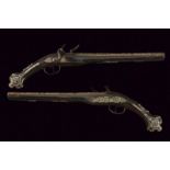 A pair of silver mounted flintlock pistols