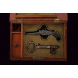 An interesting case with flintlock pocket pistol and key