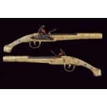 An exceptional pair of flintlock pistols with vermeil mounts