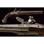 A silver decorated flintlock pistol