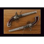 A fine pair of 'Queen Anne' flintlock pistols by Wilson