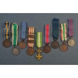 A lot of nine mignon medals