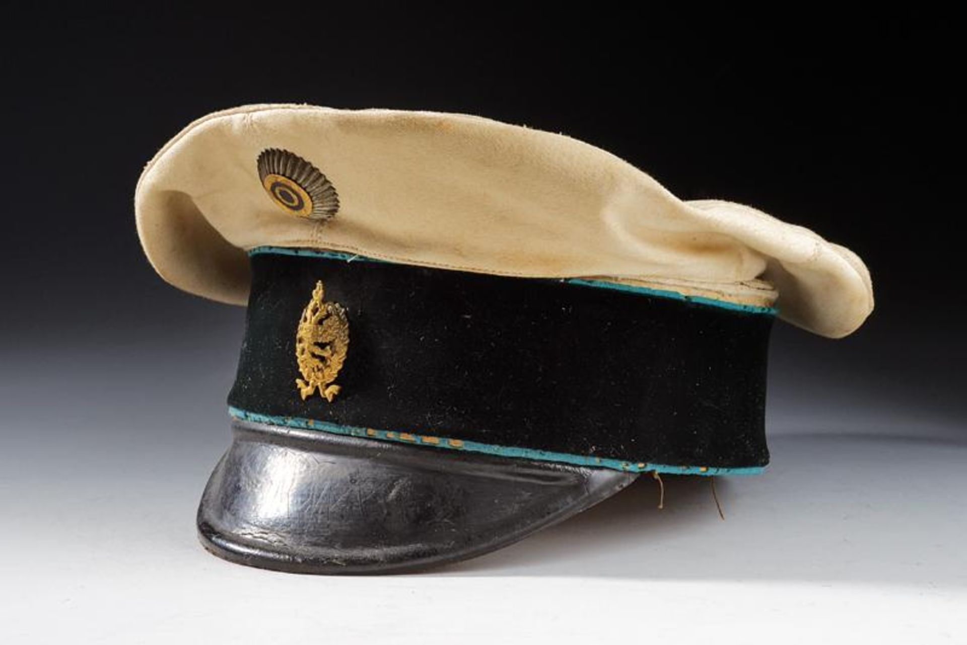 A civil servant's peaked cap