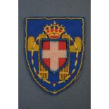 An embroidered escutcheon