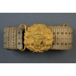 A navy officer's belt and belt buckle